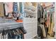 Well-organized walk-in closet with ample shelving, drawers, and hanging space for efficient storage at 830 Stone Ridge Ln, Atlanta, GA 30324
