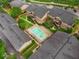 Aerial view of the property showcasing the community pool, landscaped grounds, and building exteriors at 1177 Church St # A, Decatur, GA 30030