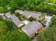 Scenic aerial view highlighting the community buildings, pool, landscaping, and parking areas at 1177 Church St # A, Decatur, GA 30030