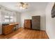 Bedroom featuring hardwood floors, ample natural light, desk and other furnishings at 1177 Church St # A, Decatur, GA 30030