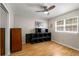 Bedroom featuring hardwood floors, closet with sliding doors and ample natural light at 1177 Church St # A, Decatur, GA 30030