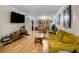 Inviting living room featuring hardwood floors, a modern couch, and an open layout at 1177 Church St # A, Decatur, GA 30030