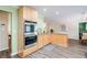 Gourmet kitchen featuring modern appliances and granite countertops at 1420 Hillside Se Pl, Conyers, GA 30094