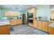 Updated kitchen with stainless steel appliances, granite countertops, and lots of space at 1420 Hillside Se Pl, Conyers, GA 30094