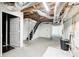 Unfinished basement featuring exposed pipes at 2564 Riggs Dr, East Point, GA 30344