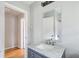Bright bathroom featuring a marble vanity with updated fixtures at 2564 Riggs Dr, East Point, GA 30344