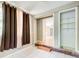 Additional room featuring white tiled flooring, neutral paint, natural light and bonus shelving at 2564 Riggs Dr, East Point, GA 30344