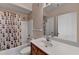 Bathroom featuring a shower with a curtain and vanity with white countertops at 3500 Sweetwater Rd # 522, Duluth, GA 30096