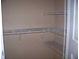 Organized walk-in closet with built-in shelves for ample storage at 3500 Sweetwater Rd # 522, Duluth, GA 30096