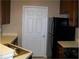 Functional kitchen with stainless steel sink, ample counter space and black appliances for easy meal preparation at 3500 Sweetwater Rd # 522, Duluth, GA 30096