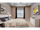 Virtually staged bedroom featuring neutral tones, tray ceiling, and ample natural light at 3500 Sweetwater Rd # 522, Duluth, GA 30096
