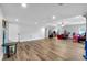 Spacious basement with wood-look floors, neutral walls, and ample living space at 4012 Ironhill Ln, Woodstock, GA 30189