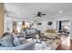 Living room with open access to the kitchen and hardwood floors at 4012 Ironhill Ln, Woodstock, GA 30189