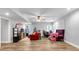 Spacious living room with hardwood floors, recessed lighting and windows at 4012 Ironhill Ln, Woodstock, GA 30189