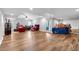 Spacious living room with hardwood floors, recessed lighting and windows at 4012 Ironhill Ln, Woodstock, GA 30189