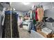 Organized walk-in closet with wire shelving, ideal for maximizing storage and keeping belongings tidy at 4012 Ironhill Ln, Woodstock, GA 30189