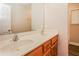 Bright bathroom with double vanity sinks, modern fixtures, and view of the shower area at 592 Cricket Hill Trl, Lawrenceville, GA 30044