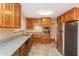 Updated kitchen with stainless steel appliances, granite countertops, and custom cabinetry at 592 Cricket Hill Trl, Lawrenceville, GA 30044