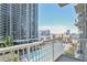 Balcony offers city and pool views, enhancing outdoor living, overlooking the water at 855 Peachtree Ne St # 1311, Atlanta, GA 30308