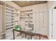 Custom walk-in closet with built-in shelving and drawers providing ample storage and organization at 855 Peachtree Ne St # 1311, Atlanta, GA 30308