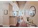 Inviting hallway featuring modern lighting, hardwood floors, and stylish decor at 855 Peachtree Ne St # 1311, Atlanta, GA 30308