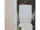 Stacked washer and dryer setup is perfect in a modern laundry space, offering efficiency at 855 Peachtree Ne St # 1311, Atlanta, GA 30308