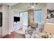 Comfortable living room featuring a glass table, stylish decor and an open balcony at 855 Peachtree Ne St # 1311, Atlanta, GA 30308