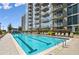 Resort-style pool with lounge chairs, offering a relaxing oasis and building views at 855 Peachtree Ne St # 1311, Atlanta, GA 30308