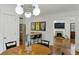 Open dining area with hardwood floors and a view to the kitchen and living room at 129 2Nd Se Ave, Atlanta, GA 30317