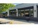 Inviting restaurant exterior with large windows, signage, and sidewalk seating at 129 2Nd Se Ave, Atlanta, GA 30317