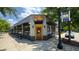 Restaurant exterior featuring a unique sign, corner location, and welcoming entrance at 129 2Nd Se Ave, Atlanta, GA 30317