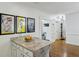 Charming kitchen with granite countertops and hardwood floors at 129 2Nd Se Ave, Atlanta, GA 30317