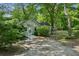 Charming home with mature trees, sidewalk and ample parking space at 4202 Maplewood Dr, Decatur, GA 30035