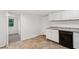 Kitchen with white cabinetry, gray counters, dark appliances, and tile floor at 4202 Maplewood Dr, Decatur, GA 30035