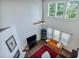This living room boasts great natural light, a fireplace, and hardwood floors at 5730 Weddington Dr, Cumming, GA 30040