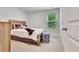 Cozy bedroom featuring neutral walls and carpet at 7730 Demeter Dr, Fairburn, GA 30213