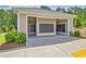 Covered mailboxes providing a secure and convenient location to receive mail, enhanced with landscaping for curb appeal at 7730 Demeter Dr, Fairburn, GA 30213