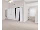 Bedroom features high ceilings, a ceiling fan and closet doors at 991 Lisa Kay Dr, Lawrenceville, GA 30046