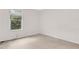 Cozy carpeted bedroom with a window view at 991 Lisa Kay Dr, Lawrenceville, GA 30046