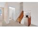 Hallway featuring stairs to the second floor and view to the living room at 991 Lisa Kay Dr, Lawrenceville, GA 30046