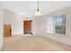 Bright living room with a window that allows in natural light at 991 Lisa Kay Dr, Lawrenceville, GA 30046