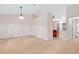 Living room featuring neutral colors and a pass-through to the kitchen at 991 Lisa Kay Dr, Lawrenceville, GA 30046