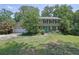 Traditional two-story home with a large front lawn and mature trees at 1315 Arden Sw Dr, Marietta, GA 30008