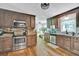 Gourmet kitchen with stainless steel appliances and custom cabinetry at 1315 Arden Sw Dr, Marietta, GA 30008
