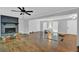 Bright living room featuring hardwood floors, a brick fireplace, and neutral paint at 1315 Arden Sw Dr, Marietta, GA 30008