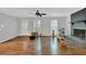 Spacious living room with hardwood floors, a brick fireplace, and plenty of natural light at 1315 Arden Sw Dr, Marietta, GA 30008