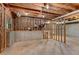 Spacious unfinished basement with exposed wood framework and concrete floor at 2350 Shore View Nw Way, Suwanee, GA 30024