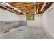 Unfinished basement space featuring exposed ceiling and concrete flooring at 2350 Shore View Nw Way, Suwanee, GA 30024