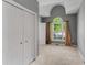 Bedroom with large closet, arched window and neutral carpet at 2350 Shore View Nw Way, Suwanee, GA 30024