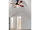 Bright attic bedroom with a pitched ceiling, ceiling fan and views into the hall at 2350 Shore View Nw Way, Suwanee, GA 30024